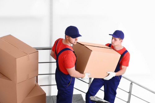 Careful furniture handling during a flat move in Lower Clapton