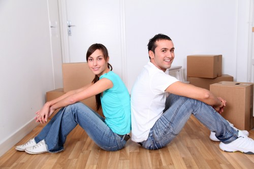 Professional movers organising boxes for a local Lower Clapton relocation
