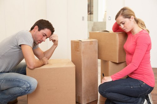 Movers handling stairs and access challenges in an East London flat